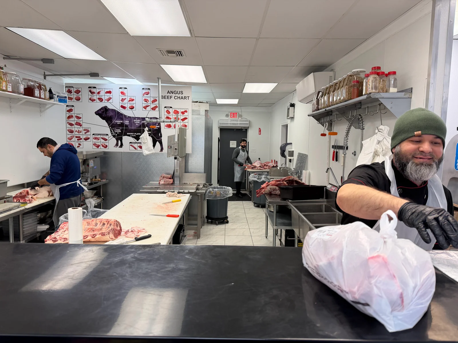 A welcome from behind the counter at the Red Lion Road butcher shop